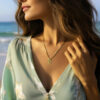 Gold Floating Plumeria Pendant w/ Emerald 15mm - Image 3