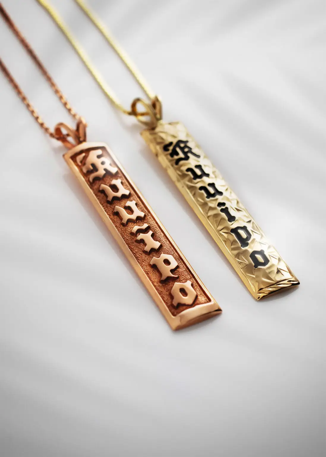 Two Hawaiian Pendants Heirloom Jewelry. 8mm solid 14K yellow and rose gold